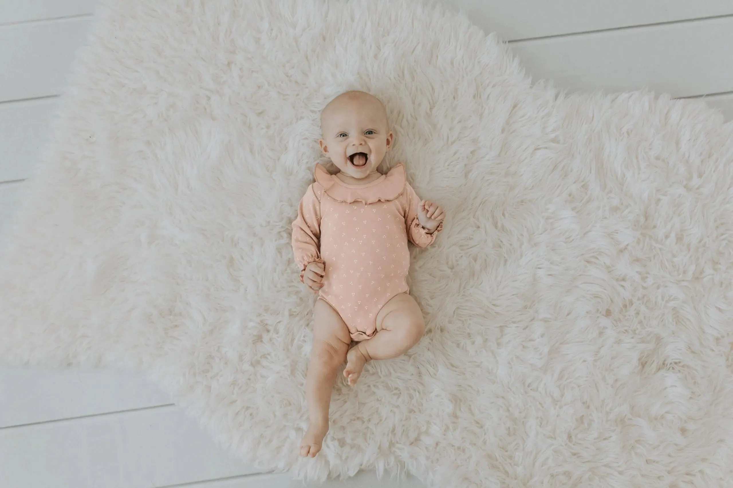 Organic Ruffle Bodysuit in Rosewater Dots | L’ovedbaby