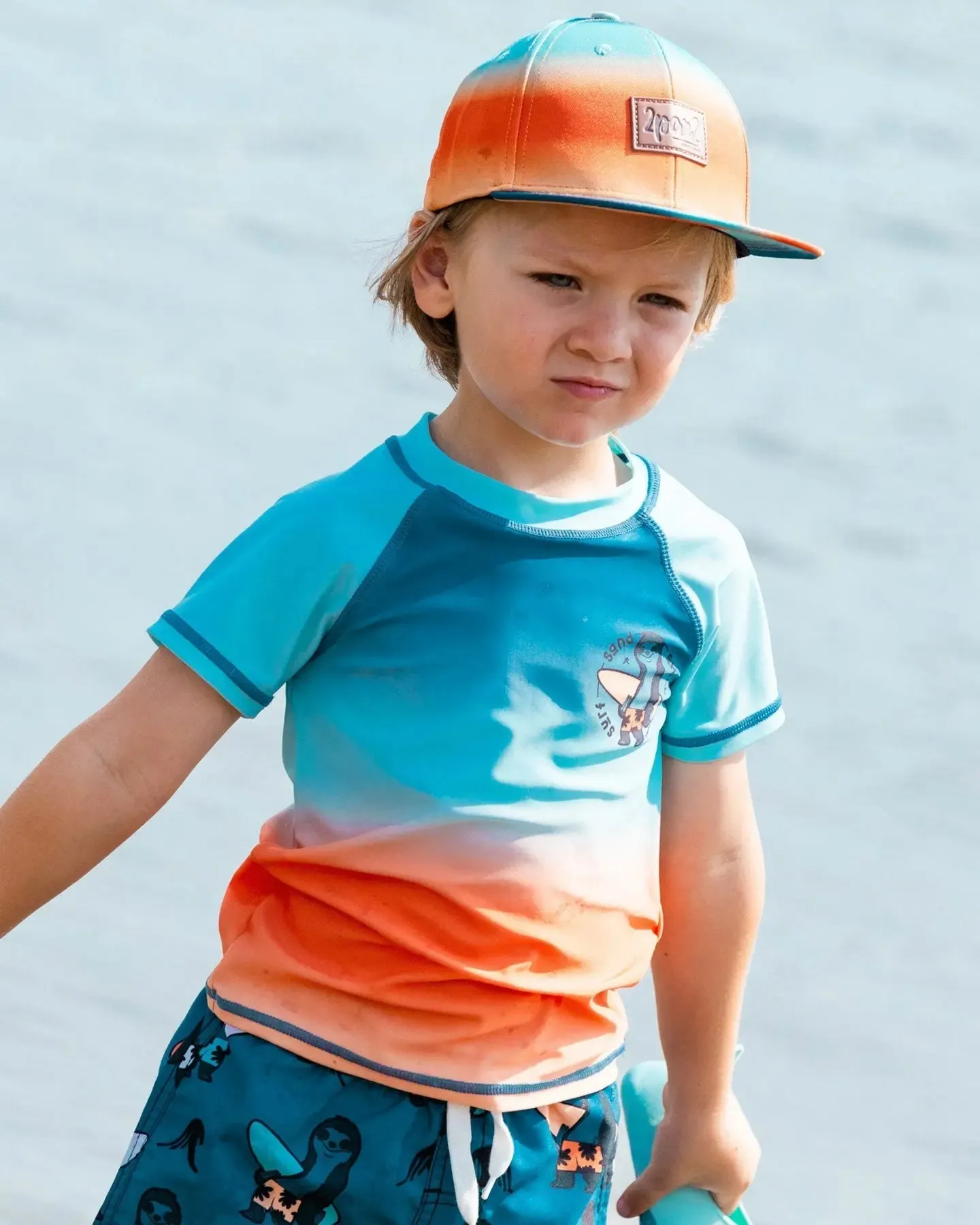 Short Sleeve Rashguard Navy Blue, Turquoise, And Orange